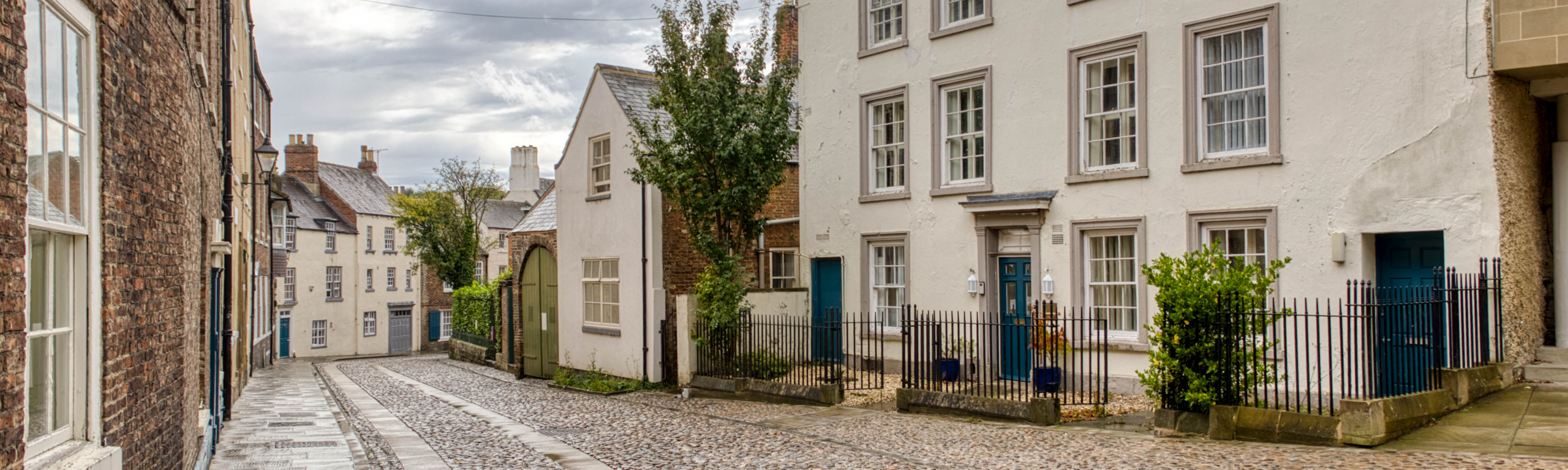 Buildings of the college lining the historic South Bailey in Durham